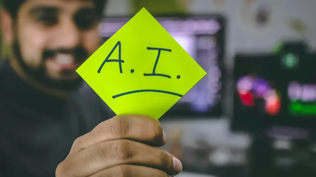 Hombre mostrando post-it. A.I.